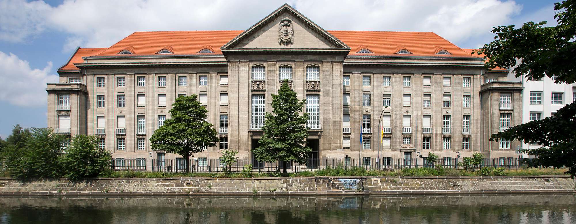 A grand German government building on a riverfront